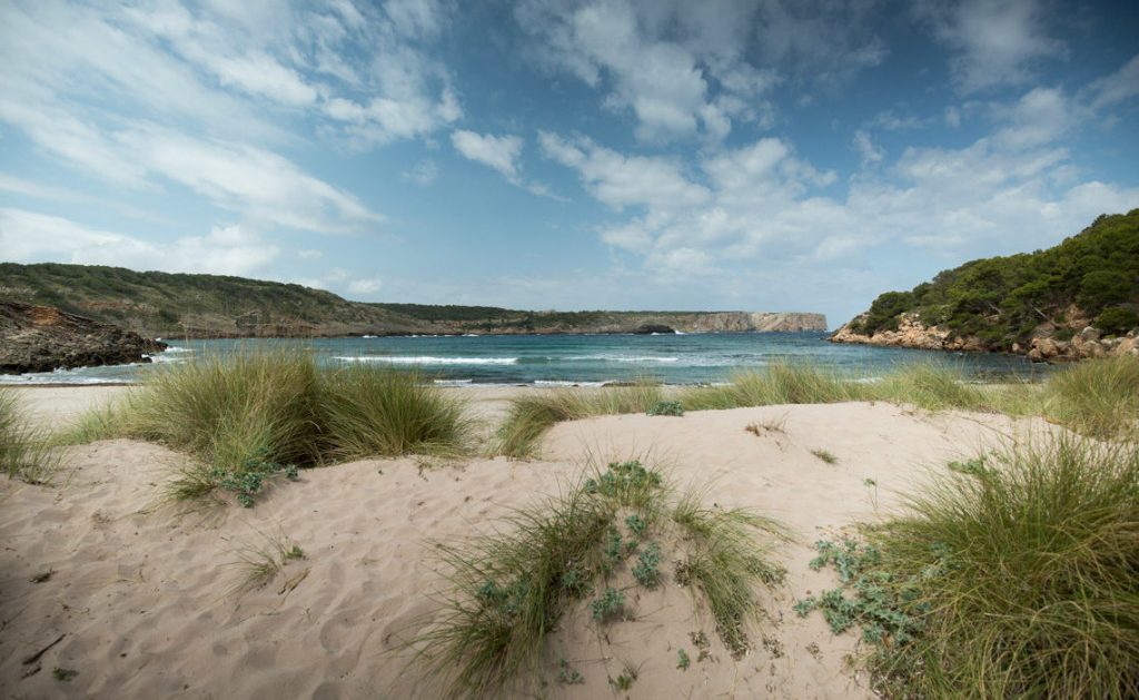 Best beaches in Menorca - sand dunes and waves